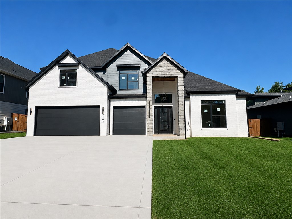 Located in the perfect location w/ easy access to Coler Mountain Bike Preserve trails, schools, downtown Bentonville & more. The heart of this haven is undoubtedly the chef's kitchen, sprawling island, vegetable sink, 5-burner/double oven gas range, quartz counters, walk in pantry, and custom stained exposed beams. Living room centers around stunning tile gas fireplace, enveloped by oversized windows that bathe the space in light and soring 2 story ceiling with track lighting. Retreat to the primary suite, where oversized windows invite in sunlight & spa-inspired bath with a walk-in tile shower featuring double showerheads, soaking tub, double sinks, smart mirrors & walk-in closet with pull down rods. Secondary bedroom on the main level with wood floors, custom beams and accent wall would also be the perfect study. Upstairs reveals a generous bonus room with a wet bar and three secondary bedrooms. Enjoy the oversized covered patio overlooking the fenced backyard. $3,000 if you use the preferred Lenders