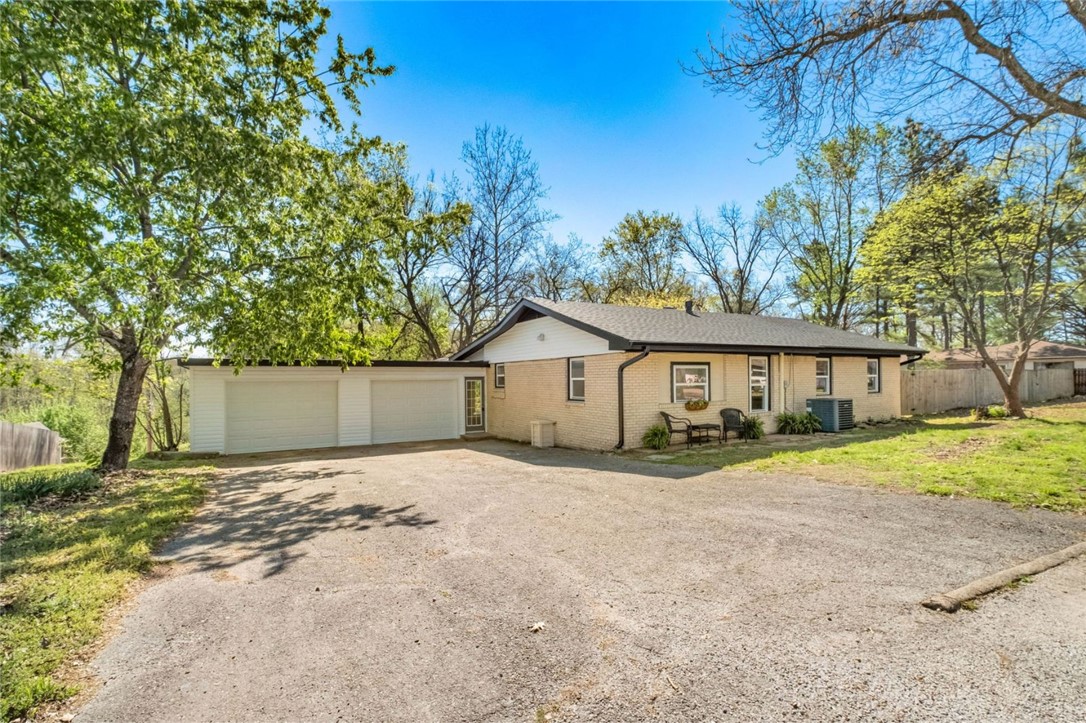 Fully remodeled and ready for its next chapter! This 3 bedroom, 2 bath home originally built in the 1970s has been thoughtfully updated and is move-in ready. Enter through the mosaic tile entry into the spacious living area filled with natural light. Just off the living area is a dedicated home office with insulated walls, perfect for working from home, studying, or hobbies. Up three steps you’ll find the brand new kitchen with ample cabinetry and workspace, offering plenty of room to cook and entertain. New flooring runs throughout, giving the home a clean, modern feel. The primary bedroom features a large walk-in closet with excellent storage. An oversized two-car garage offers extra space for vehicles, tools, or storage. Step onto the back deck and enjoy the peaceful sounds of nature. A classic home brought back to life with modern updates. A new survey is underway and property lines will be marked soon. The adjacent vacant lot will be listed separately for sale. Agent is related to seller.