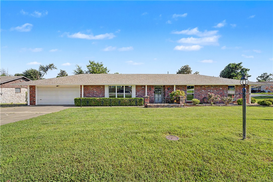 Beautifully updated 3-bedroom, 2-bath home on a corner lot just minutes from Downtown Rogers! This 1,964 sq. ft. single-level home features a second garage and a flexible bonus room perfect for a second living area, office, or playroom. The remodeled kitchen offers granite countertops, tile backsplash, and a new dishwasher. Enjoy a low-maintenance backyard with synthetic turf and a flagstone patio. Exceptional parking and workspace make this home stand out, with two driveways, an attached 2-car garage, and an attached shop garage featuring an oversized 16’ x 10’ door. Thoughtful updates include Pella windows, new bedroom carpet, a new roof, water heater, HVAC and furnace, plus remodeled primary bathroom and bonus room. Conveniently located near shopping, dining, parks, and everything Downtown Rogers has to offer! **Washer, Dryer, Fridge, and Microwave included**