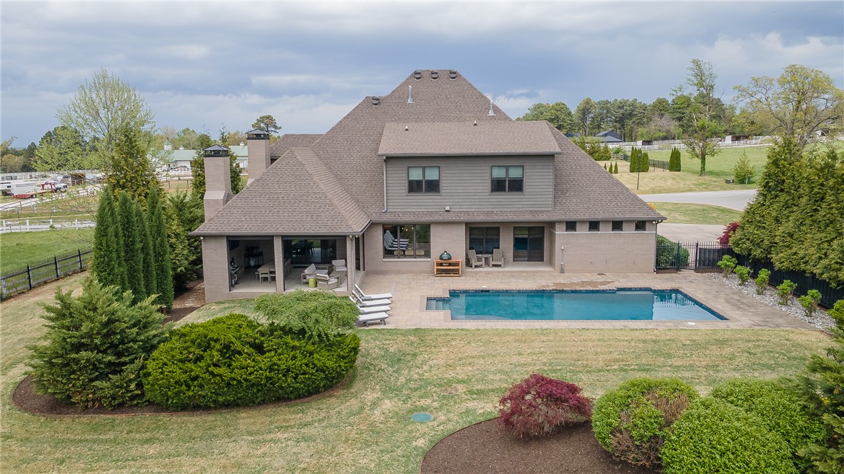Spacious luxury living in this 5-bedroom, 3.5-bath home located in a quiet, no-HOA 
neighborhood. Designed for both everyday comfort and elevated entertaining, the chef’s kitchen 
features soapstone countertops, double islands, and dual pantries, flowing seamlessly into a large 
eat-in kitchen and formal dining space. A dedicated formal office adds flexibility for work or 
study. Upstairs offers generously sized bedrooms and a large bonus room perfect for a media 
room, playroom, or gym. The primary suite is a true retreat with a spa-like bath and heated towel 
rack. Enjoy whole-home audio with a built-in speaker system throughout. Step outside to a large  
backyard oasis complete with a heated saltwater pool and removable mesh safety fence with pre
drilled anchors. The 3-car garage boasts an epoxy-coated flooring, combining durability with a 
polished look. A rare combination of space, luxury, and thoughtful design.