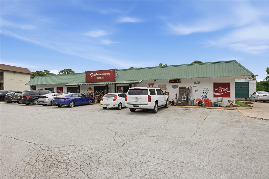 Turnkey commercial opportunity in the heart of Eureka Springs! Situated on major highway frontage with outstanding visibility, this thriving retail consignment business offers over 11,000 sq ft of usable space and multiple income streams. The established business features over 100 vendor booths rented monthly by artists, collectors, antique dealers, and local businesses, providing consistent recurring revenue with room for expansion. A finished 40x70 warehouse adds additional retail space, while a loading dock opens opportunity for large deliveries. Two apartments offer added rental income or a live/work setup. A large parking lot provides excellent customer access and currently generates additional rental income from a food truck and ice vending machine. With a proven business model, strong cash flow, exceptional visibility, and endless opportunities to expand or diversify, this is one of Eureka Springs’ premier commercial investment opportunities.