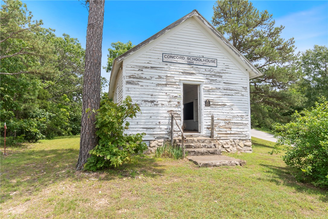 Charming Historic one room schoolhouse on .36+/- acres, full of character and endless possibilities. A unique opportunity to own a pice of local history.