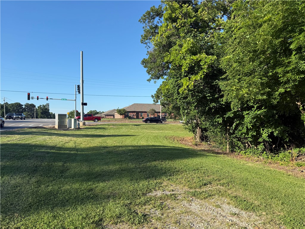 This is a prime commercial or mixed-use development site located in the booming Northwest Arkansas corridor. Positioned at the hard corner of West New Hope Road and South 26th Street. This 3.18+/- acre lot maximizes visibility and traffic exposure. Multiple possibilities