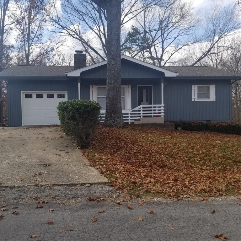 This adorable bungalow has been freshly updated inside and out! Fresh exterior paint and lattice. Inside boasts all new vinyl plank flooring throughout, fresh paint, new bathroom vanities and fixtures and updated, modern light fixtures. Native stone, wood burning fireplace is the focal point of the living room. Washer and dryer are provided for tenant use. Large formal dining room. Bonus room has a large closet and would make a great den, office, family room, or possible third bedroom. Screened in deck for outdoor entertaining with newer carpet and fresh paint. Winter views of Lake Windsor! Handyman space or man cave area under deck with electricity. Great terraced planter beds for the gardening buff!