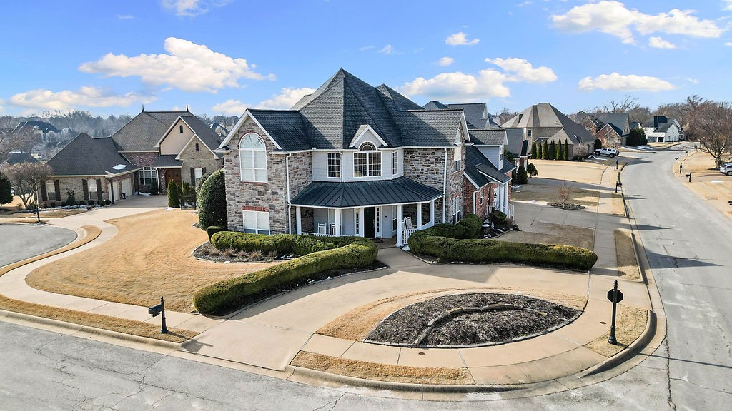 This gorgeous home truly checks every box with space and style for everyone. Located in the desirable Shadow Valley community, enjoy private security and exceptional country club amenities including golf, tennis, pickleball, pool, fitness center, restaurant, lounge, basketball courts, playgrounds, fishing lakes, and more. Thoughtfully designed, the home features a gourmet kitchen, two inviting main-level living areas, and seamless access to a covered patio complete with a built-in outdoor grill—perfect for entertaining. The spa-inspired primary suite offers a deep soaking tub, fully tiled steam shower, and two impressive walk-in closets. Plantation shutters throughout add timeless elegance and quality. Upstairs you’ll find three bedrooms, three baths, a loft, and a bonus room, providing outstanding flexibility for any lifestyle. Partial golf course views, mature landscaping, and a quiet cul-de-sac setting make everyday living feel like a private retreat.