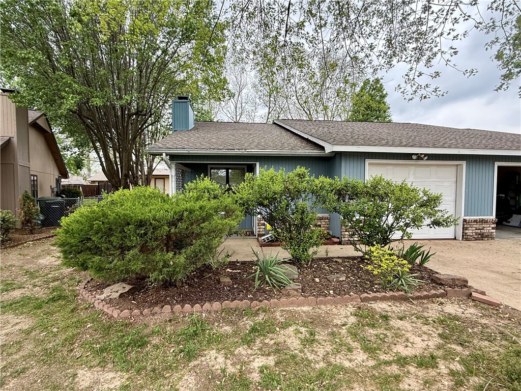 Convenient Rogers Duplex with Sunroom & Private Courtyard! 2-bedroom duplex located in a great Rogers location close to schools, shopping, dining, and everyday conveniences. This home features a functional layout with a one-car garage, spacious living area, and an added sunroom perfect for relaxing, office space, or additional sitting area. The interior offers tile flooring throughout all main living areas with carpet in the bedrooms for added comfort. The Jack-and-Jill style bathroom includes a tub/shower combination and convenient access from both bedrooms. Enjoy the privacy of your own fenced courtyard—ideal for outdoor seating and low-maintenance enjoyment. Owner to manage property with approved application. NO PETS FIRM Owner to manage with approved application