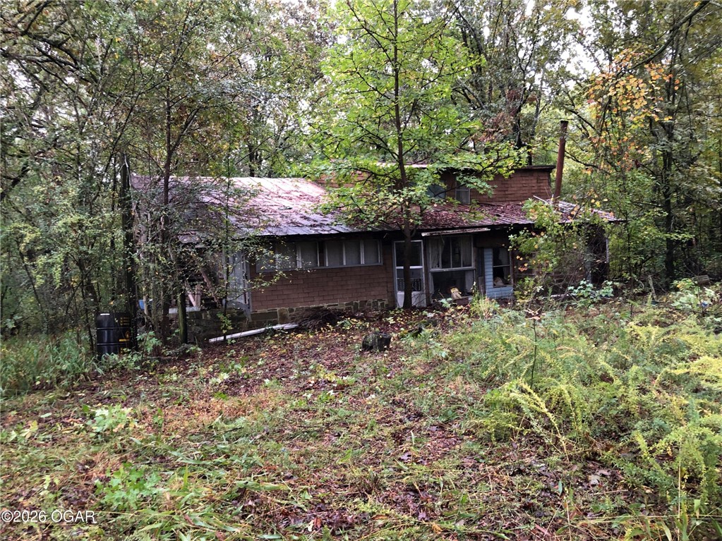 Opportunity awaits on this 1.03+/- acre property in Franklin County at 16006 Camp Newell, Ozark, AR. Built in 1979, this 1,680 sqft home offers potential for renovation, investment, or a future project for buyers ready to bring their vision to life. The property includes 1 bathroom and is being sold as-is. Limited information is available regarding the condition, age, or details of the interior improvements. The home will require significant repairs and updates. Convenient rural location with space to create your own setup while still being within reach of Ozark amenities. Property details taken from public records. Buyers are encouraged to conduct their own inspections and due diligence regarding condition, measurements, utilities, and intended use.