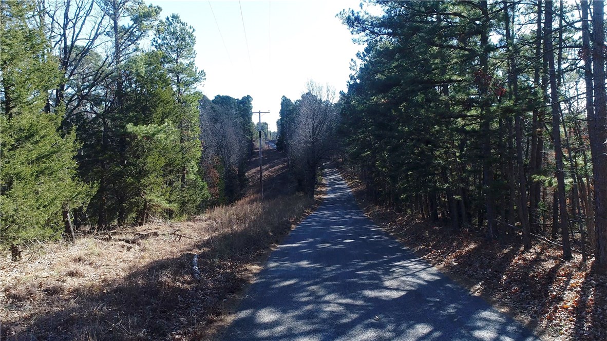 Development potential or a large track of land Just minutes from all of Eureka Springs tourist attractions. Pavement road frontage. Multiple build sites and views. Electricity on site. This property is the country/rural life people are looking for with all the amenities of the city life just a short drive away. This property has unlimited potential.

Click the Video tab to view the VIDEO