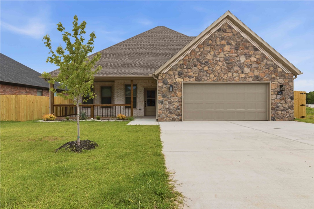 This eye-catching newly built home is in a prime Bentonville location with an outstanding price! Welcome your family to Walnut Grove Estates, conveniently located near Bentonville schools, fast food and restaurants, gas stations, grocery stores, Walmart Distribution Center, and XNA Airport! Enjoy the amenities this neighborhood has to offer such as the walking trail (now active) and community pool (coming very soon)! This beautiful home offers 3 spacious bedrooms, 2 full bathrooms plus a guest bath downstairs, a split floor plan, granite counter tops, wood floors not only in the common areas, but in the primary suite as well, and a nice size pantry. Enjoy the upgrades throughout such as the stand-alone soaker tub, a fully tiled walk-in shower, adjustable LED Mirror lights in the master bath and upstairs bath, and a beautiful floor to ceiling stone surround electric fireplace. Back of the property holds a nice size fully sodded fenced backyard with back patio. Have peace of mind with a one-year builder's warranty!