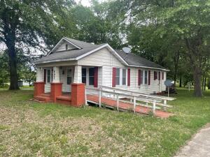 Cottage style house with newer windows, hardwood floors, large bedrooms.