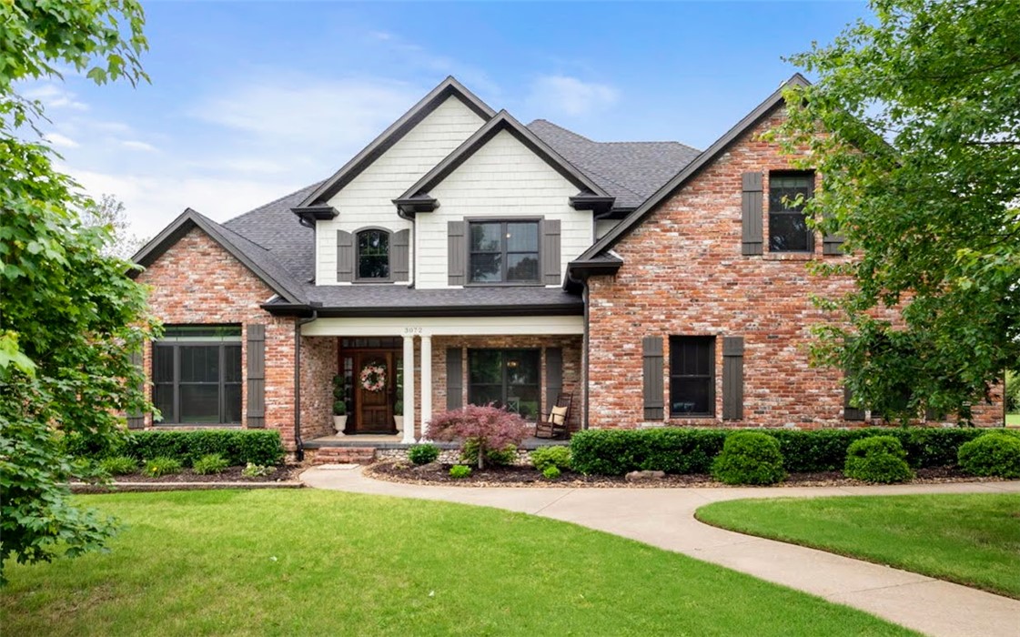 Magnificent, gated estate style home nestled on almost 3 acres very close to Fayetteville and Springdale.  This home has been meticulously maintained and updated over the last 8 years and it shows. The grounds are gorgeous and the majority of the exterior items have been upgraded or replaced.   The home features an open floor plan with two living areas and is perfect for family and entertaining.  Formal dining and dedicated study greet you on the entry.  An additional dining area off the kitchen is open to a living room complete with fireplace, bar area and tons of natural light. The second living area features fireplace as well and looks through a large glassed-in sun room. The kitchen is equipped with high end appliances, granite and custom cabinets.  Primary suite on the first floor featuring recently remodeled bath with 2 walk-in closets, sitting area and fireplace; all other bedrooms and a bonus room on the second floor.   A large circular patio out back tops it off! This home is pristine and needs nothing!