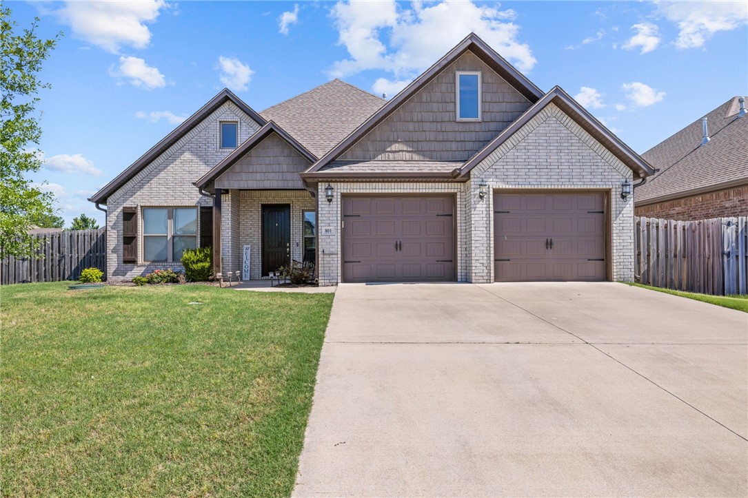 Located just minutes from the Walmart AMP and the Pinnacle Hills area, this 4-bedroom, 3-bath home offers a convenient location close to shopping, dining, and entertainment. The main living area is open and bright, and the kitchen includes extended cabinetry and added counter space into the dining area for extra storage and prep space.
The primary suite and an additional bedroom and full bath are located on the main level. Upstairs you’ll find two more bedrooms, a shared bathroom, and plenty of attic storage.
Enjoy the covered patio and backyard space - great for relaxing or having friends over. Just a short drive to everything Rogers and Bentonville have to offer.