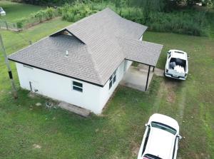 Seller has already done alot of the remodel work such as New H&A system New roof, New Windows, New Sheetrock and trim, New cabinets, New counter tops New Shower/Tub Combo and upgraded electrical wiring and panel box.New Buyer can finish up the rest and reap all the rewards!!!