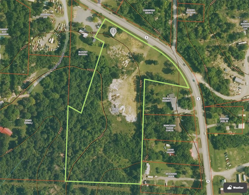 Most land this close to Mountain Home comes with strings attached—zoning, covenants, deed restrictions. This one doesn't. 7.75 acres m/l on Hwy 5 North, surveyed and ready, with a road already cut through for access and building areas cleared and waiting. Electrical and natural gas are available at the road. Water is across the street. The land transitions from open ground to mature hardwoods as you go deeper, with enough variety to give a developer real options for how to lay out the site. The location does a lot of the heavy lifting here—Hwy 5 North puts you minutes from Mountain Home's shopping, medical and dining, while the land itself still feels like the Ozarks.