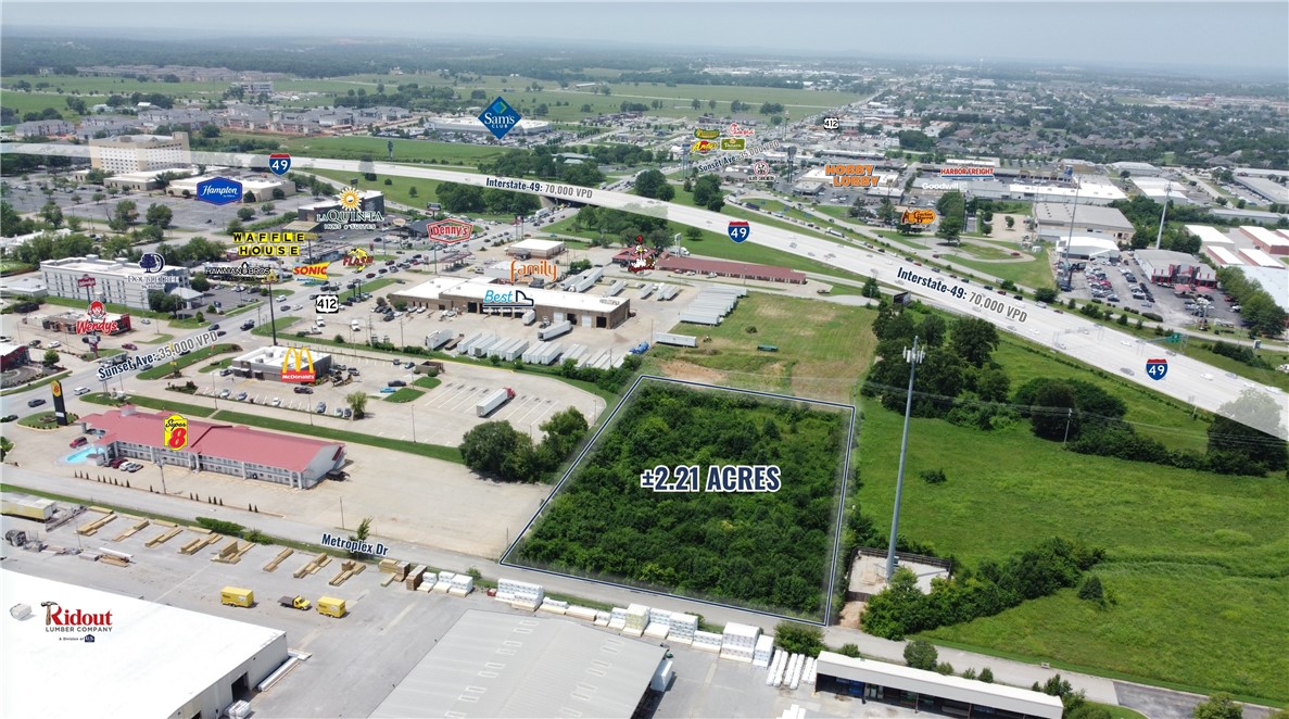 Available: ±2.21 acres.
Asking price: $500,000.
Price per acre: $226,244.
Zoning: C-2.
Parcel: 815-30052-140.
Sewer: On site.
Water: On Metroplex Dr.

Site highlights
Located less than a mile from I-49, this ±2.21-acre C-2 zoned parcel is listed at $500,000 ($226,244 per acre).
The site is surrounded by C-2, C-5, and I-1 zoning uses.
Sewer is on site, and water is located on Metroplex Drive.
Traffic counts include 35,000 VPD on Sunset Avenue and 70,000 VPD on I-49.