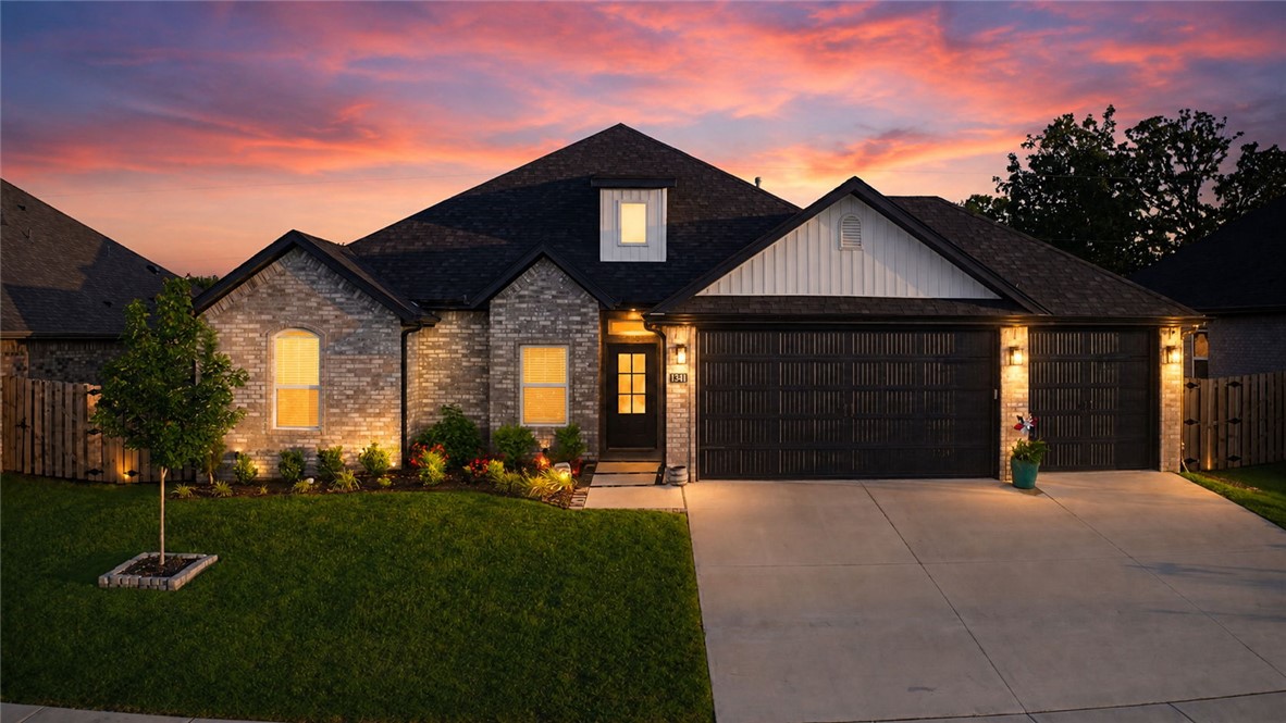 North Facing 3 Car Garage - Nearly-new 4-bedroom, 2.5-bath home in Bentonville’s sought-after Oakmont Subdivision — built in 2024 and lightly lived in, so you get the feel of new construction without the wait. The open floor plan flows from a chef-ready kitchen with custom cabinetry, granite countertops, and stainless steel appliances into a spacious living area anchored by a gas fireplace. The primary suite and en suite bath offer a private retreat at the end of the day. Outdoors, enjoy a covered patio, fully fenced backyard, gutters, and a rare 3-car attached garage. .Wood, tile, and carpet floors throughout. Convenient split floor plan keeps bedrooms private. UPGRADES: IRRIGATION SYSTEMS AND PROFESSIONAL LANDSCAPING HELP THIS PROPERTY STAND OUT IN THE SUBDIVISION.  Near top-rated Bentonville schools and just minutes from Centerton amenities. Move-in ready — this one truly shows like new.