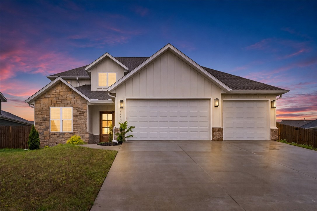 Luxury living meets everyday comfort in this beautifully designed 5-bedroom, 3-bath home in sought-after Cobble Creek of Rogers. This versatile floor plan offers upscale finishes and an unbeatable Northwest Arkansas location. The main-level primary suite features a spa-like bath with soaking tub, tiled walk-in shower, and oversized closet with direct laundry access. A second main-level bedroom and full bath provide flexibility for guests or a home office. The chef’s kitchen showcases quartz countertops, gas cooktop, stainless appliances, dual pantries, and abundant storage, flowing into the open-concept living and dining areas with vaulted ceilings, natural light, and a stunning stone fireplace. Upstairs offers three bedrooms, a full bath, and a spacious bonus room. Enjoy a large private backyard with room for a future pool. Minutes from Rogers Schools, Pinnacle Hills, shopping, dining, trails, entertainment, and major employers. Near Mercy, Walmart AMP, and corporate offices, this move-in-ready home offers luxury.