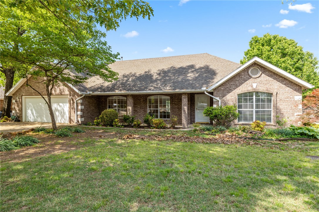 This is a charming 3-bedroom, 2-bath home located in the heart of Prairie Grove, offering the perfect blend of comfort and convenience! With just over 2,000 square feet, this well-maintained property features an updated sunroom - ideal for relaxing or entertaining year-round. Situated within walking distance to Prairie Grove schools, this home is perfect for those seeking accessibility and community connection. Nestled on a quiet street, this property has beautiful mature trees that provide shade, privacy, and a serene setting. Enjoy small-town living with easy access to nearby amenities and the growing Northwest Arkansas area, known for its family-friendly atmosphere and charm.