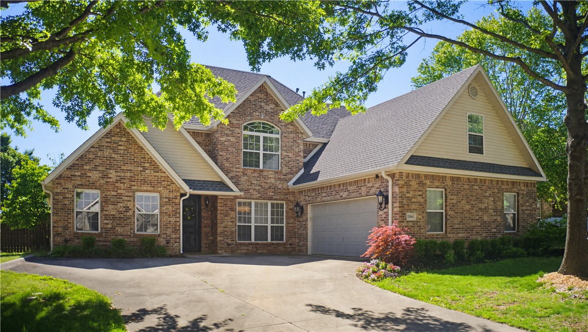 Conveniently located near top notch schools and curated walking trails, this 4 bedroom, 2.5 bath home has plenty of room for everyone. On the main level, a cathedral entry greets you and invited you into the large living area. The 2-sided fireplace connects the living room and an additional hearth sitting room/den on the other side. The large kitchen has a ton of light with ample countertop space and cabinets for storage. There is an eat-in space in the kitchen and also an additional formal dining room/office. The primary bedroom suite is extra-large, with room for sitting areas. Upstairs you will find three additional, spacious bedrooms and one full bath. Outside, the back yard is nicely landscaped, and the extended patio offers an excellent place to relax. There is additional storage room off of the garage with plenty of room for extra refrigerators, toys, or holiday decor. Recent updates include a new Roof 2023, Carpet 2021, HVAC 2019, Water Heater 2026, and Fence 2024. Preferred lender credit is available!