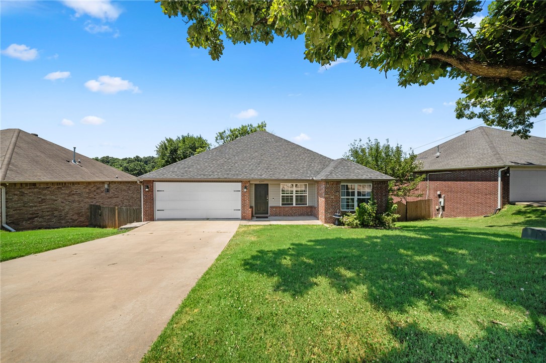 Welcome home! This move-in ready 4-bed, 2-bath home offers a spacious split floor plan in a desirable subdivision in the highly sought-after Lowell/Springdale area. Conveniently located just minutes from I-49, you’ll enjoy quick access to shopping, dining, schools, parks, and everything NWA has to offer. The open-concept living and kitchen area is perfect for entertaining guests or enjoying everyday life. The spacious primary suite features elegant tray ceilings, a walk-in closet, and a private bath complete with a walk-in shower and a separate jetted whirlpool tub. You'll also enjoy two versatile bonus rooms that can be used as extra bedrooms, a home office, playroom, gym, or whatever best suits your lifestyle. Step outside onto the back deck and relax in the large, fenced backyard overlooking open fields with no back neighbors, providing added privacy and peaceful views. This home truly offers the perfect combination of space, comfort, and unbeatable location. Schedule your private showing today before it’s gone!