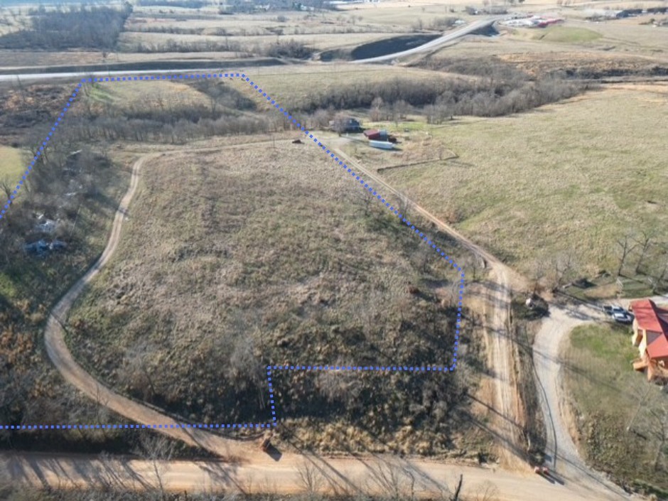 Discover 11.81  beautiful acres in thriving Bentonville, conveniently located near Northwest Arkansas National Airport. Nestled in a fast-growing area, this property offers the perfect balance of privacy and accessibility. With rural water available and septic needed, this land is ready for your custom home, family estate, or future investment. An adjacent 18.31 acre parcel is also available for purchase, giving you the opportunity to create over 30 acres of combined space. Enjoy the benefits of owning acreage in one of Northwest Arkansas’ most dynamic and expanding markets.