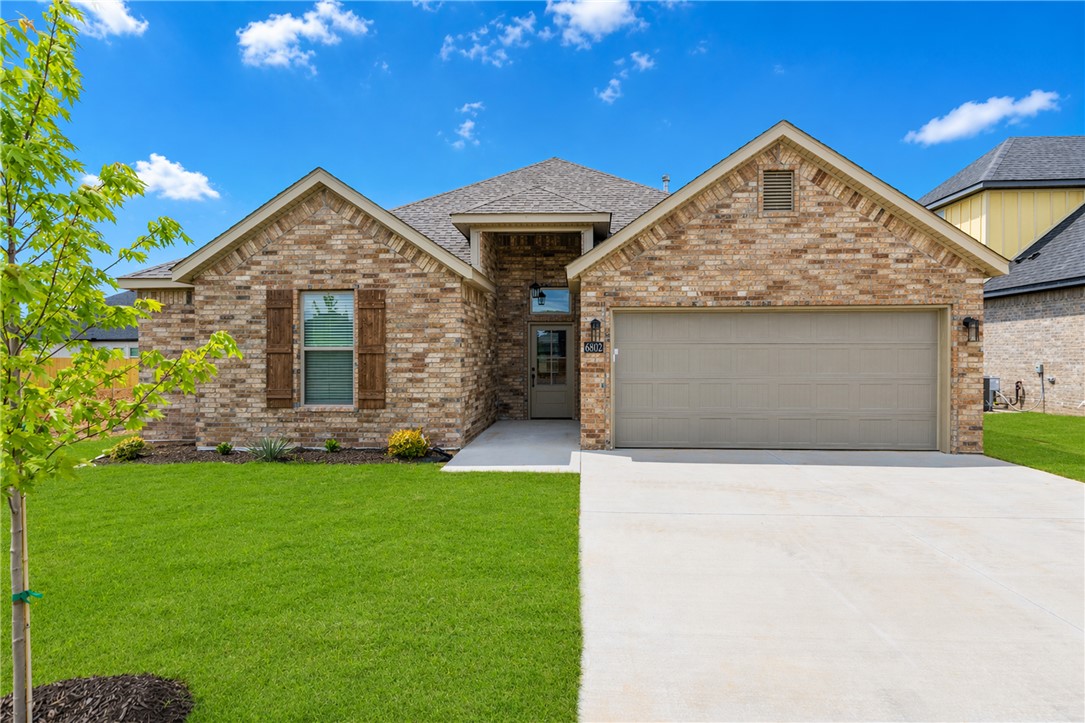 Welcome to this stunning ALL brick newly built home in one of Bentonville's hottest subdivisions, Walnut Grove Estates! This upcoming neighborhood is just minutes from schools, restaurants, grocery stores, XNA Airport, and Walmart Distribution Center! Home offers 3 bedrooms along with 2 full bathrooms and many upgrades throughout! Enjoy quartz counter tops, a beautiful floor to ceiling stone surround electric log fireplace in the living room, a pantry with a kitchen island, upgraded LVP flooring in the main areas as well as in the master suite, and a nice size covered back patio! Master is a true retreat! Enjoy a spacious room with a walk-in closet, a soaker tub, a fully tiled walk-in shower with additional handheld shower heads, a rain overhead shower head, and dual vanity sinks! Blinds, gutters, and a wood privacy fence are included in purchase price! Neighborhood pool and other POA amenities coming soon! Seller offering $5,000 in buyer concessions! Preferred Lender offering up to $3,500 towards closing costs!
