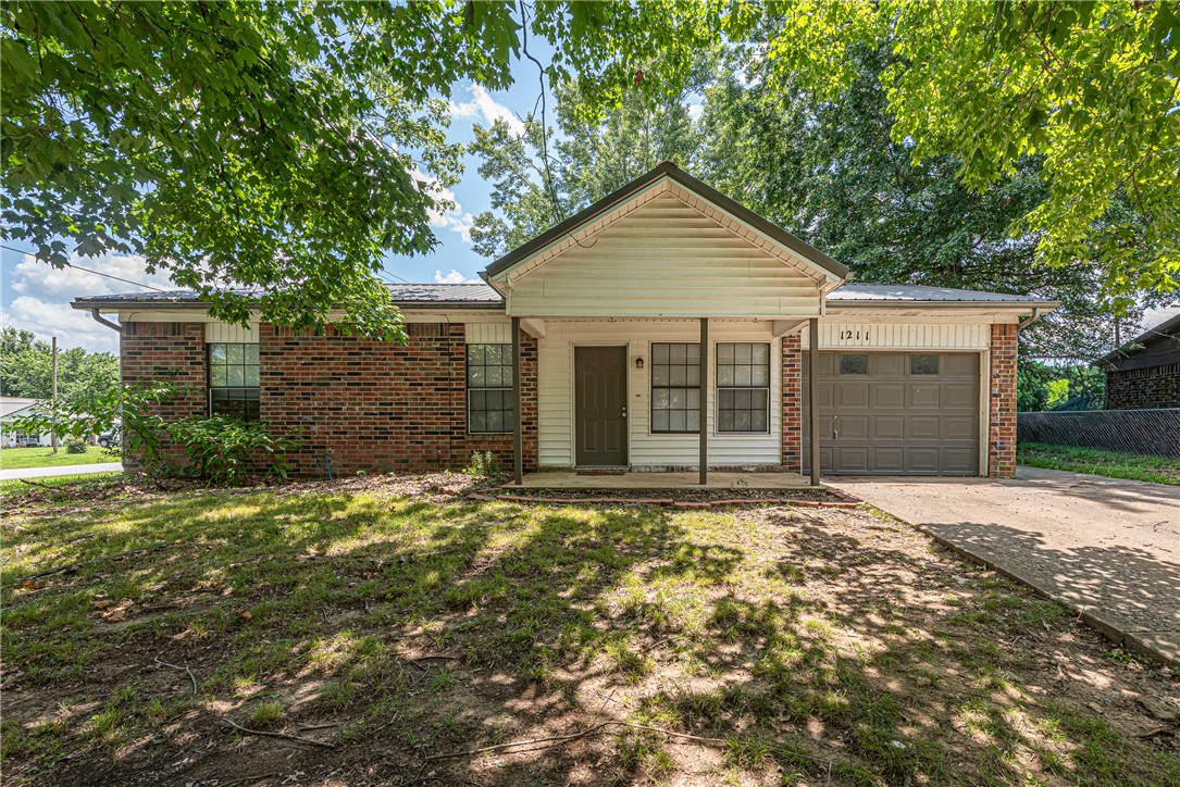 WELCOME HOME! Renovated in 2024, this 3 bed 1 bath home on a corner lot is conveniently located in the heart of Elkins with easy access to schools, parks, shopping, and the Elkins Sport Complex. From the covered front porch, head inside to the welcoming living area filled with natural light and LVP floors throughout the home! Eat-in galley kitchen that features granite countertops, stainless steal appliances, and ample cabinet space. Relax and rejuvenate in the spacious primary bedroom. 2 additional bedrooms offer flexibility for guests, a home office, or other needs! The bathroom features granite counters and a tiled walk-in shower. Outside enjoy a large backyard, perfect for relaxing, entertaining, or outdoor activities! This home offers endless opportunities and is one you won't want to miss!