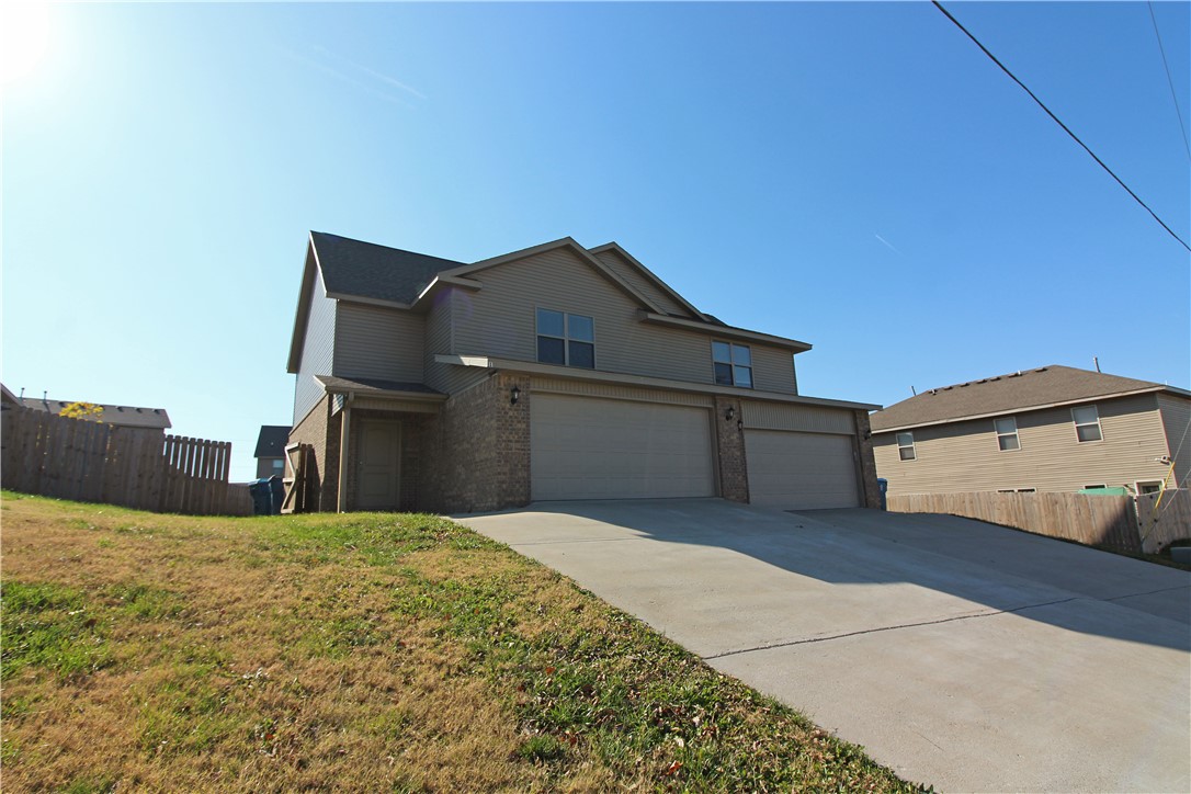 A 2 level- 3 bedroom, 2 1/2 bath, 2 car garage townhome and super location. Close to bike trails and schools. Vinyl flooring in main areas downstairs with open living area & kitchen. Granite counters through out. All appliances to convey + washer/ dryer. All bedrooms are on 2nd level with half both downstairs. Spacious back yard and fenced for privacy. Pets considered with increased deposit.  $50 per person to apply.