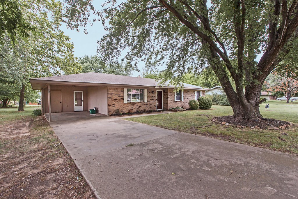 PANORAMA OF POSSIBILITIES.  This home sets your mind to racing with creative living ideas. This Farmington home sits on 0.38 of an acre right in town close to Wal-Mart neighborhood market and Fayetteville! Have some peace and quiet on a back patio under the pergola that was added in 2016! Per Seller: new roof in 2009, water heater in 2002, new furnace and AC unit in 2014 and more! 100% Financing Eligible Area! Call today! Seller will review all offers on Wednesday, August 1st, 2018 at 7 pm.