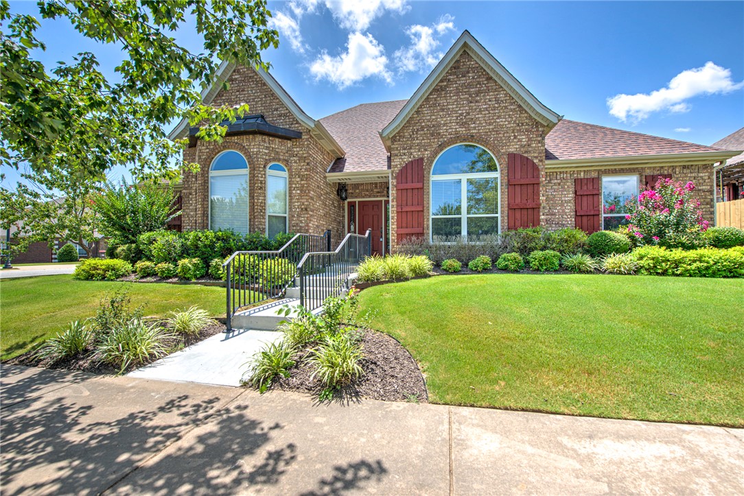 Freshly painted, this exceptional Har-Ber Meadows all brick home is move-in ready and showcases custom craftsmanship, high-end finishes, and an unbeatable location. From the rich hardwood floors & custom molding to the elegant built-ins & thoughtfully designed split floor plan, every detail reflects quality and style. The kitchen features granite countertops, stainless steel appliances, pantry storage, & a spacious eat-in bar—perfect for everyday living and entertaining. The private primary suite offers a tray ceiling, French doors leading to a covered patio with 220V for a future hot tub, plus a spa-inspired bath with jetted tub, walk-in shower, double vanity, & generous closet space. Additional highlights include a side-load 3-car garage, central vacuum, whole-house speakers, surround sound, irrigation system, & custom built-in bookcases with a rolling ladder. New roof in 2025. Enjoy all that Har-Ber Meadows has to offer, including lakes, parks, pool, clubhouse, and nearby shopping, dining, and schools.