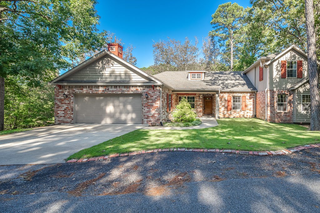 HUGE Family Home with split bedroom plan, spacious rooms, tall ceilings with crown molding, multiple living areas.  Sells with 3 lots one on each side of house for privacy. Two decks, walk out basement. Neighbors have pride in houses, Flat front yard. House is 0.4 of a mile from Buckingham Trail Head.  Lot on left side is  fully landscaped, additional storage building. Large working kitchen. 2nd floor room use your imagination, plus more storage. Bentonville Schools. The main level heat pump  2019. The owners insurance company has agreed to replace the roof, exact date still in progress. Great looking wood floors in part of house. There is a outside entrance to a nice work/shop area in the lower level.