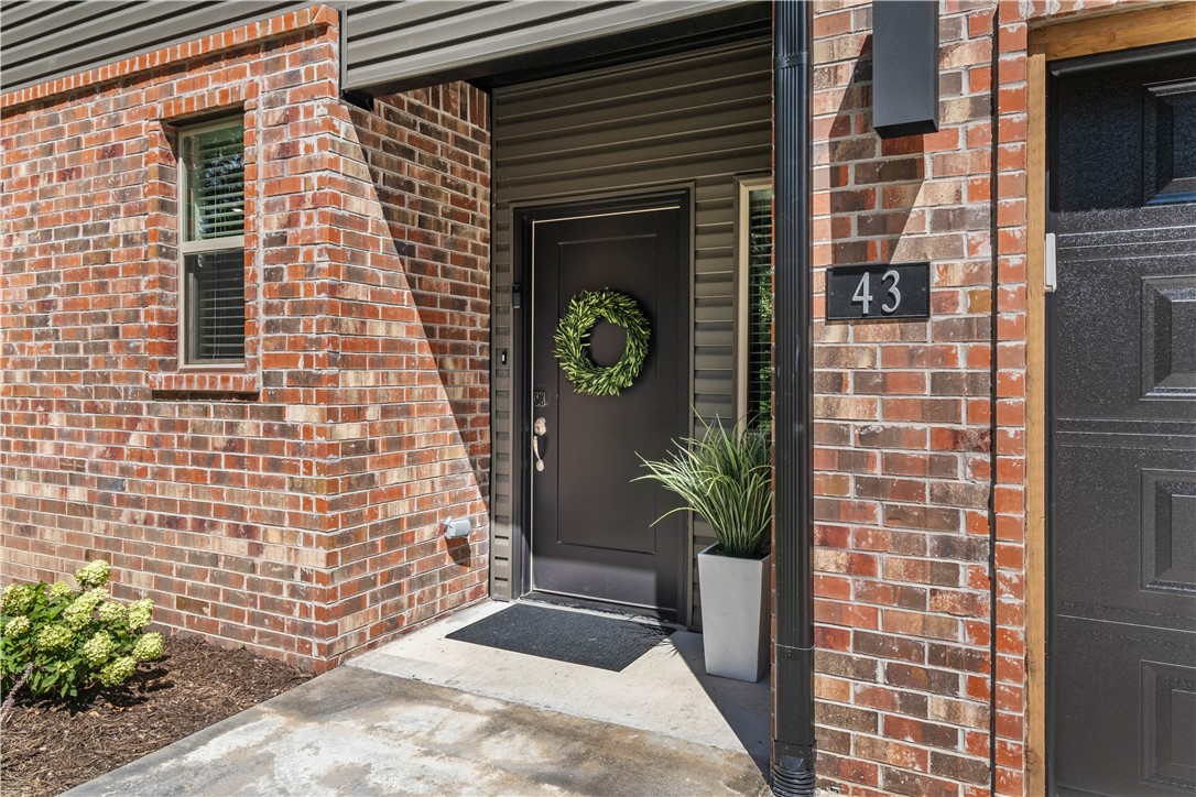 Don't miss this prime Bella Vista location just minutes from Lake Park, Lake Ann, and the world-famous Back 40 Trails! 
This like-new 2-bedroom, 2.5-bath home with a 1-car garage offers the perfect blend of comfort and adventure. The bright, open floor plan features a spacious kitchen and living area, while both bedrooms and the laundry are conveniently located upstairs. Extra driveway parking and a peaceful backyard setting that backs to common area provide added privacy and easy access to nature.
 Ideal for first-time buyers, young professionals, investors, or anyone looking to enjoy the Northwest Arkansas lifestyle—just a short drive to downtown Bentonville, dining, and entertainment.