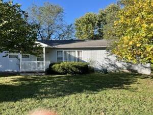 This is a 3 bedroom 1 1/2 bath house with a unfinished basement that sits on 2 lots. Lots of room with 2 living rooms, dining room and breakfast nook.  This house sits in a great location close to restaurants, doctors and shopping.