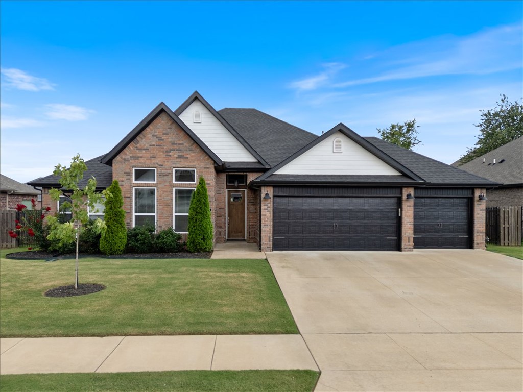 From the moment you walk in, you'll love the warmth this home offers. Beautiful wood flooring, abundant natural light, and a thoughtful split-bedroom layout create a space that feels both comfortable and functional. With 4 bedrooms and 2.5 baths, there's room for everyone to spread out while still enjoying spaces that bring people together. Located inside the gated Westridge community, you'll enjoy neighborhood amenities including a community pool and playground, all while being just minutes from Bentonville schools, shopping, dining, I-49, XNA Airport, and some of Northwest Arkansas' most popular outdoor destinations like Coler Mountain Bike Preserve. If you've been looking for convenience, comfort, and a location that puts you close to everything Northwest Arkansas has to offer, this home checks all the boxes.