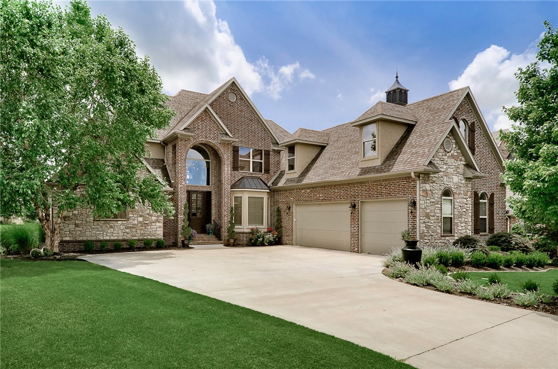 BEAUTIFUL completely remodeled golf front home with all new designer upgrades overlooking #5 tee box. Master bedroom has its own area of luxury with a sunroom/exercise room and custom built-in coffee bar & storage area. Master bath has limestone floors, soaker tub, porcelain vessel sinks w trough faucets. Travertine floors, commercial appliances, copper hood & farm sink w built-in wine bar & fridge in kitchen. 4 bedroom, 41/2 bath. Bonus/Game room(5th bdrm).PLUS FULL MEDIA ROOM!$5000 Golf membership conveys!