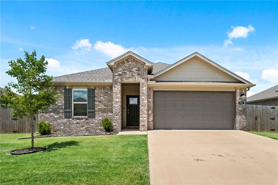 Welcome to 903 W Nursery Rd in Rogers! This well-maintained 4-bedroom, 2-bath home offers 1,796 square feet of comfortable living space with a bright, open-concept floor plan. The spacious kitchen features a large island with seating, ample cabinet space, and flows seamlessly into the dining and living areas, making it ideal for both everyday living and entertaining. The private primary suite includes an ensuite bath and generous closet space, while three additional bedrooms provide flexibility for family, guests, or a home office. Enjoy modern finishes, abundant natural light, and a functional layout throughout. Conveniently located near schools, shopping, dining, and everything Rogers has to offer, this home is one you won't want to miss!