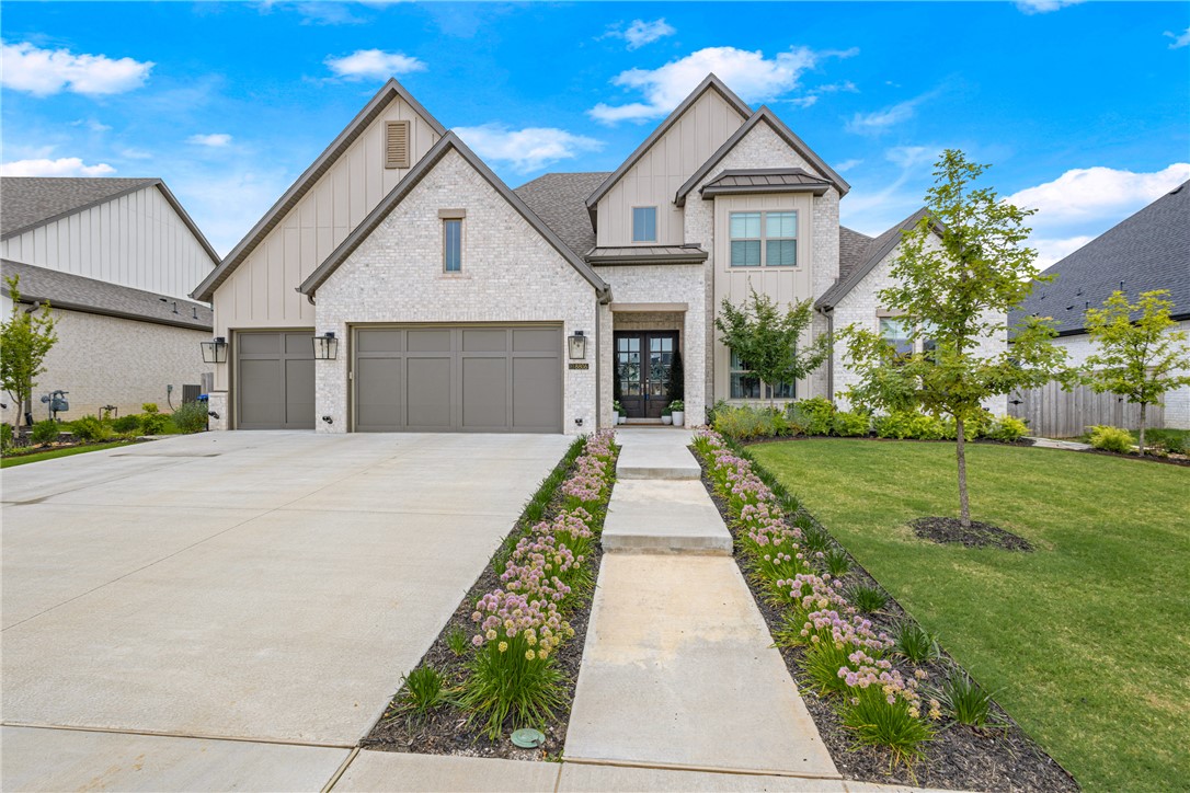 Move-in ready Evening Star residence showcasing refined upgrades & exceptional attention to detail. Professionally landscaped grounds set the tone for an impeccably curated interior featuring designer lighting, custom fireplace surround, stair runner, drapery & automated blinds. Main living area offers a serene, light-filled space with built-ins and a statement fireplace. Kitchen is appointed with quartz countertops, gas cooktop, built-in oven & walk in pantry. Elegant dining space. Enjoy outdoor living on the covered patio. Functional luxury continues with a spacious laundry and mudroom off the 3-car garage. The main level hosts two guest suites with walk-in closets and a dual-vanity guest bath. The private primary retreat features wood floors, abundant natural light, and a spa-inspired bath with soaking tub, large walk-in shower, and WIC. Upstairs offers a secondary living area and en-suite bedroom. All located in highly sought after community with amenities, near schools, and Pinnacle district.