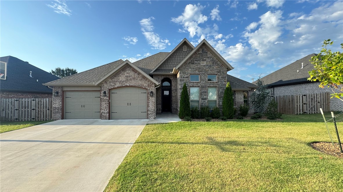 Beautiful new construction home on the east side of Lowell. Split floor plan. The main living area has wood style tile flooring and carpet in bedrooms. Gas fire place in living room. Lots of natural light. Kitchen features stainless appliances and nice pantry. Master has tile shower and large walk in closet. Fenced yard.