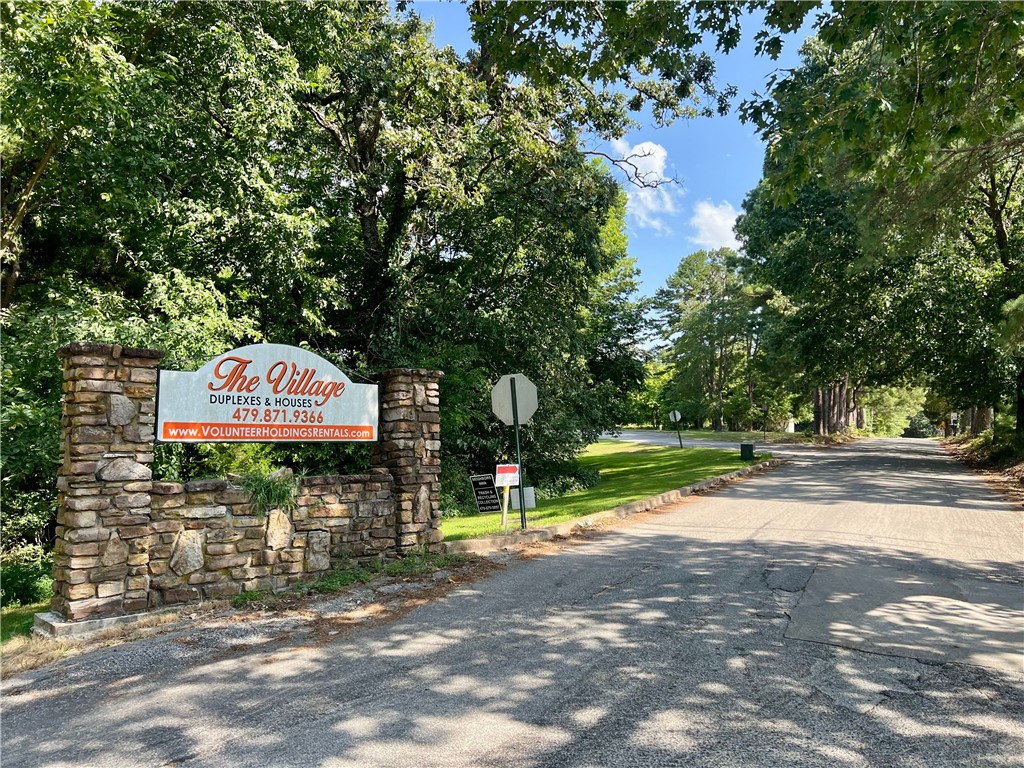 31.6 Acres of income producing property consisting of 5 single family homes, 11 duplexes, and 15 one bedroom apartments. Sizes vary from 900 sqft, 1 Bedroom units to 1350 sqft. two bedroom units. Single car garages. Laundry Rooms, Commercial Kitchen, Back up Generator, Approximately 6 Acres for future development. Property being sold "As Is".