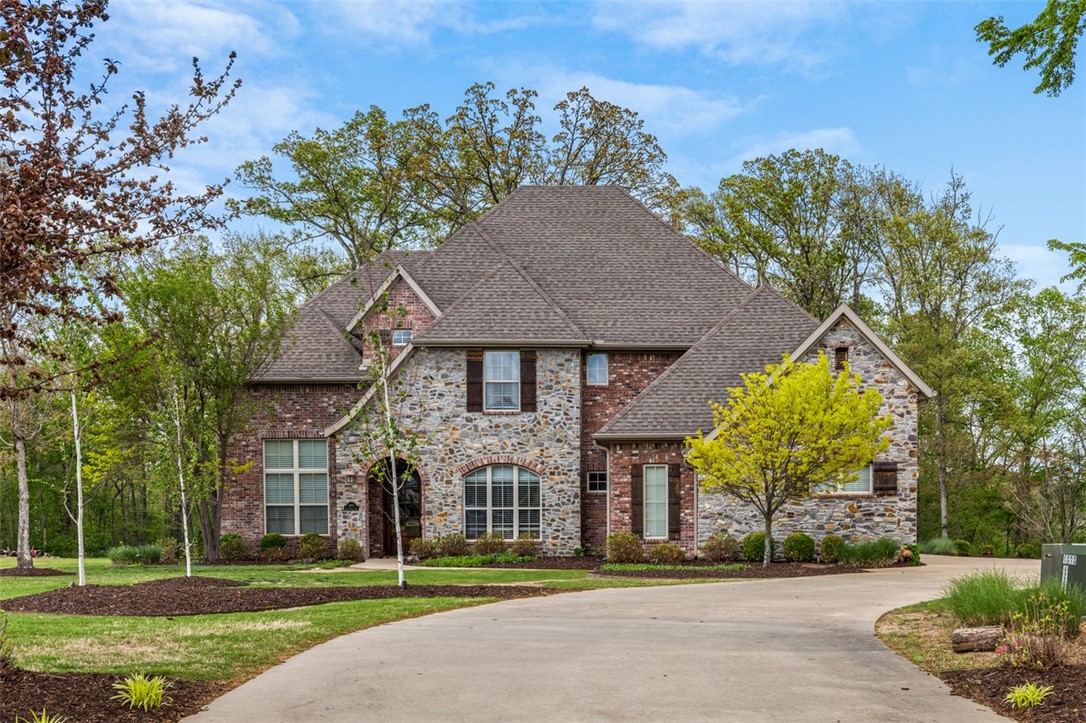 Welcome home to 1484 Le Chesnay Drive, where privacy, space, and high-end finishes come together on over 1.5 acres of flat, wooded beauty.
This stunning 4,700 sq ft home offers 4 bedrooms, 3 full baths, 2 half baths, a dedicated office, and a versatile flex room providing ample space for every member of the family to live, work, and unwind. Located in the upscale, established community of Versailles, set across 200 acres of beautifully wooded landscape, this neighborhood offers a truly elevated lifestyle. Just minutes from Ardis Ann Middle School and Elm Tree Elementary, convenience meets refinement. Inside, real hardwood floors and high-end finishes flow throughout, creating a warm and sophisticated atmosphere from the moment you enter. The 3-car garage features epoxy floors and excellent organizational space.  Step outside to enjoy the peace and privacy of your wooded lot, a serene, natural backdrop.  Escape the ordinary live surrounded by trees, space, and elevated design