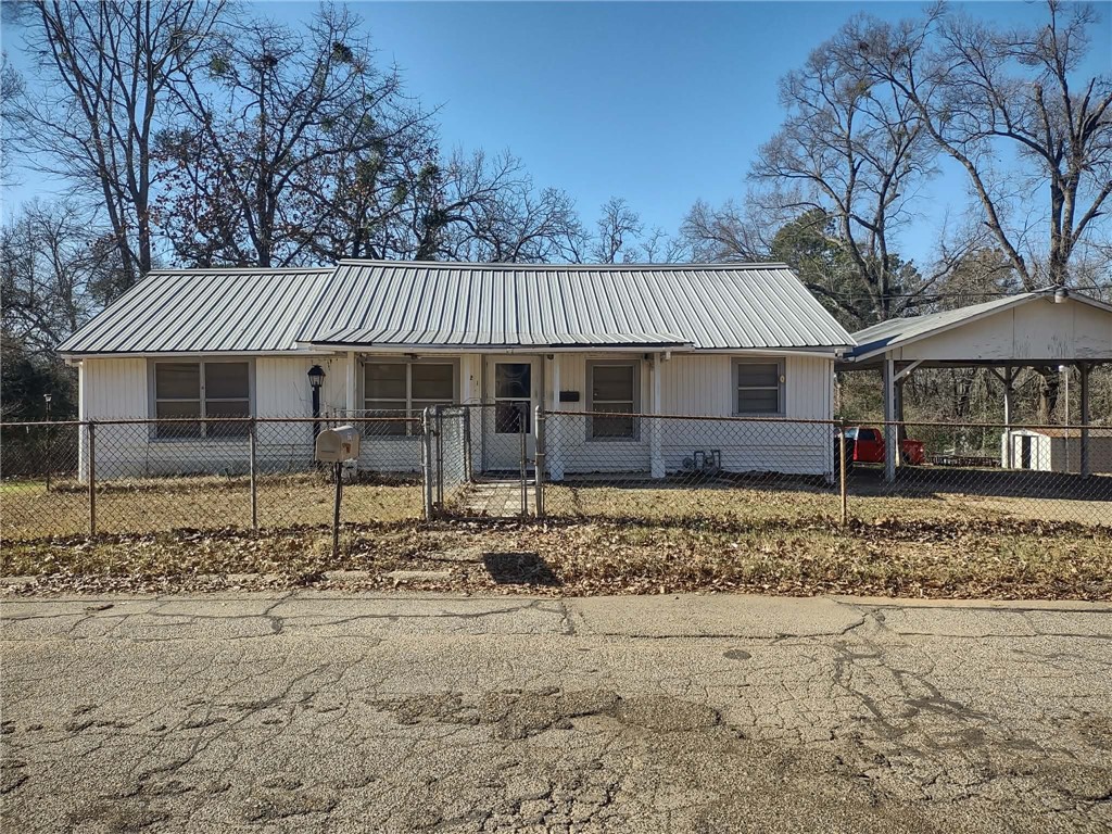 Great investment opportunity or a great chance at your first home! 3 bdr 1.5 bath 1,139 sq ft home on three lots totaling .55 acres. Three lots have different parcel numbers, so buyer could potentially sell the lots separately or could add tiny homes to the other two lots to maximize the property's potential. Priced to sell and selling the home "as is" with no repairs. Lots of options with this property! Set up your showing today!