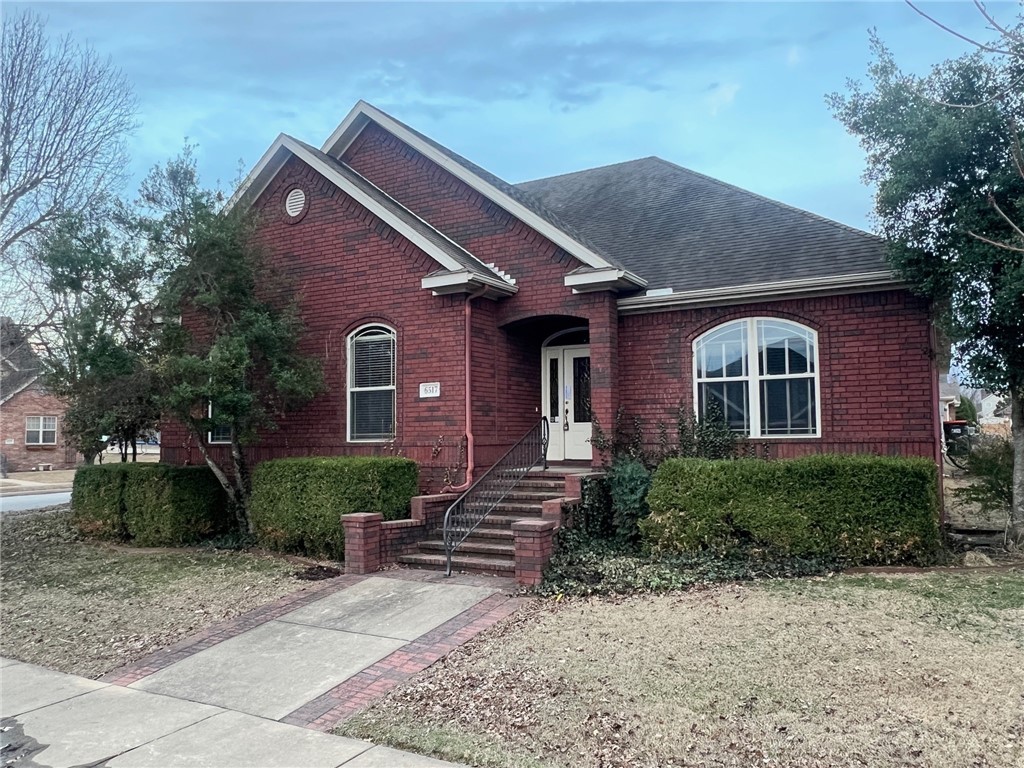 Great all brick home on corner lot! Home features 4 bedrooms, 2 baths, 2 car garage, gas log fireplace in living area, master bath complete with jacuzzi tub and separate shower. Home has wood floors in dining and living area. Kitchen has built in wine fridge, cherry cabinets and breakfast nook. Home has enclosed sunroom & wood patio for entertaining. All appliances.