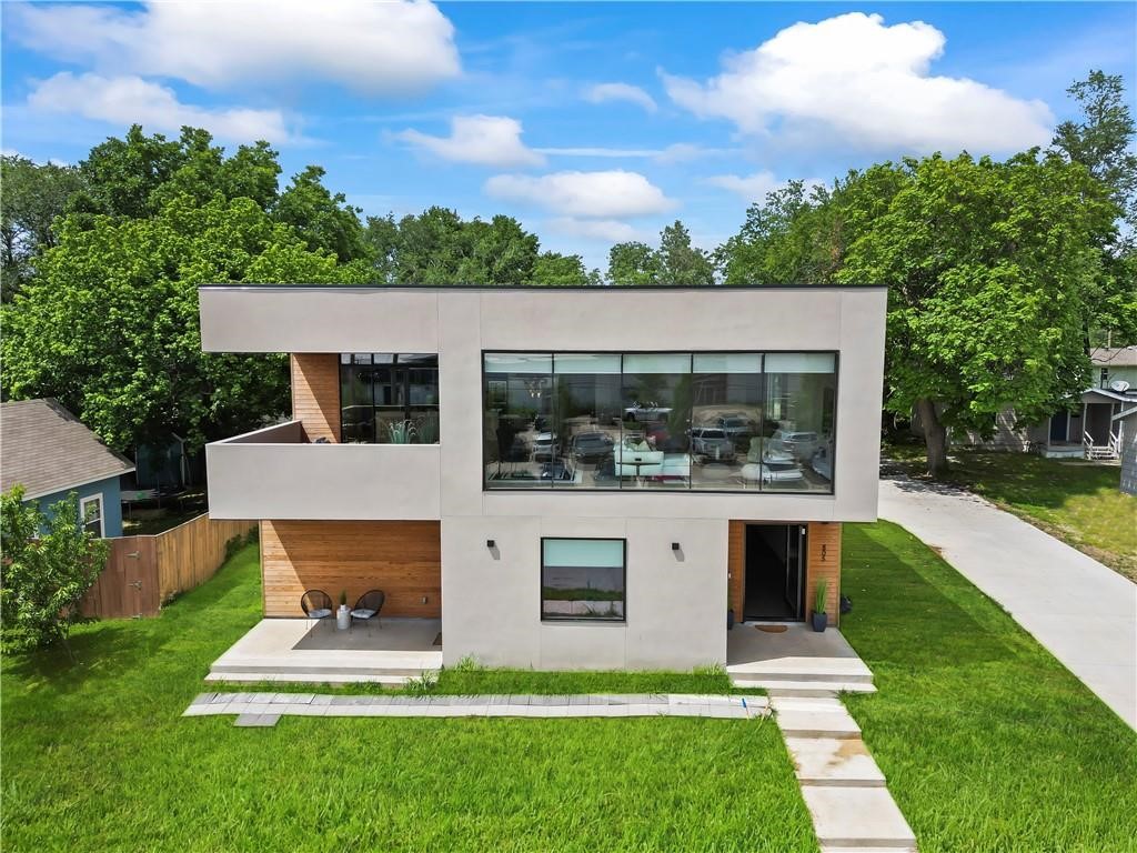 Attention all home buyers, investors and entrepreneurs seeking the perfect blend of residential & commercial space! Presenting a remarkable opportunity in the vibrant heart of Downtown Bentonville that is zoned DN-4 for Multi-use. A home, rental potential or Commercial space is walking distance to the new HO & Downtown was intentionally crafted by a local architect to maximize the potential. Designed with a modern flare & built with natural elements, this home features 2 levels, 6 bedrooms & 4 baths. Current space is designed for 3 separate Units for Airbnb/rental potential with owners living on the 2nd level. Main level- rent as Unit A:2 Bdrms+Living room; Unit B:1 Bdrm+living room. 2nd Level designed with open living, dining & kitchen & has floor to ceiling windows, Chefs kitchen, 3 brms & 2 baths. Don't miss out on this rare chance to own a multi-use property in the heart of Downtown Bentonville. If your seeking a live[1]work space, this property has the potential to be a game-changer for you.