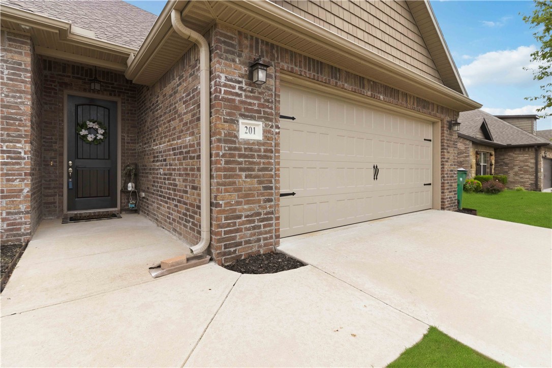 Move-in ready and perfectly positioned in one of Northwest Arkansas's fastest-growing communities, this beautiful 4-bedroom home combines modern style with everyday functionality. Bright, open living spaces create an inviting atmosphere that's ideal for both relaxing and entertaining. The kitchen and bathrooms showcase granite countertops and beautiful backsplashes, adding a fresh, contemporary touch throughout the home. Step outside to an extended patio with a gazebo—an inviting outdoor retreat perfect for hosting friends, weekend barbecues, or unwinding at the end of the day. With a thoughtfully designed layout, this home offers comfortable living in an established neighborhood just minutes from Bentonville schools, shopping, dining, and parks. $3,000 in lender credits through the preferred lender.