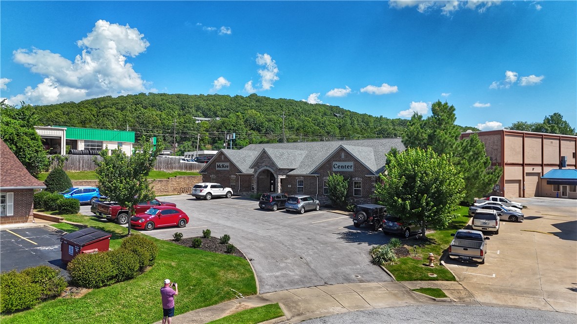 • 4,960 square feet on 0.5 acre
• 24 Executive Suites with private parking
• Fully leased with flexible, month-to-month tenants
• Great location in the heart of Fayetteville, directly off of College Avenue (US-71 Business) in Urban Corridor
• Occupant ready, second-generation office space with minimal capital improvement needs
• Ideal for Owner-Operators or Investors: Options may include occupying all or part of the space, increasing rents to secure long-term leases, and more