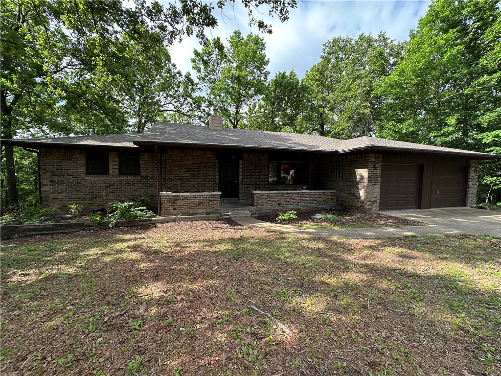 Discover the perfect blend of comfort and natural beauty at 76 Bayview Drive. This inviting 3BR/2BA home offers 1,541 sq ft of well-designed living space, highlighted by warm interiors and plenty of natural light. Located just moments from Norfork Lake, it’s ideal for boating, fishing, and outdoor adventure. Enjoy peaceful mornings on the porch, a spacious yard for gardening or play, and the quiet charm of Mountain Home living.