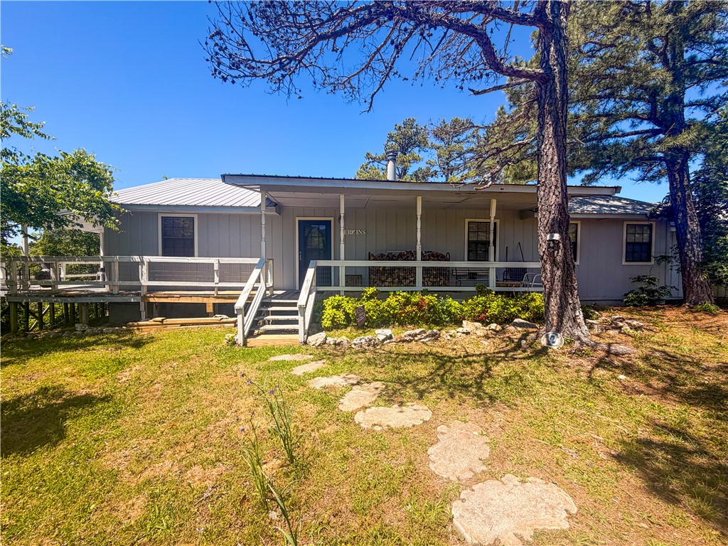 Perched on top of a mountain in Eureka Springs, this 8.69-acre property offers incredible views, privacy, and plenty of space. Located outside of town with no known restrictions, this property gives you freedom and seclusion!  

The home features 3 bedrooms and 3 full bathrooms, with all three bedrooms having private access to a bathroom. There is also an additional office space located through the garage — perfect for working from home, hobbies, or extra storage. The oversized garage includes two garage doors and ample storage space.  This home has many classic finishes including hardwood through out the main living. 
Very private with no through traffic, this property is ideal for those looking to escape the noise and enjoy peaceful mountain living. Access to the property is a steep dirt road, but it is accessible and traveled daily by homeowners and visitors alike. Whether you’re looking for a full-time residence, vacation home, or investment opportunity in the Ozarks, this one is worth taking a look!