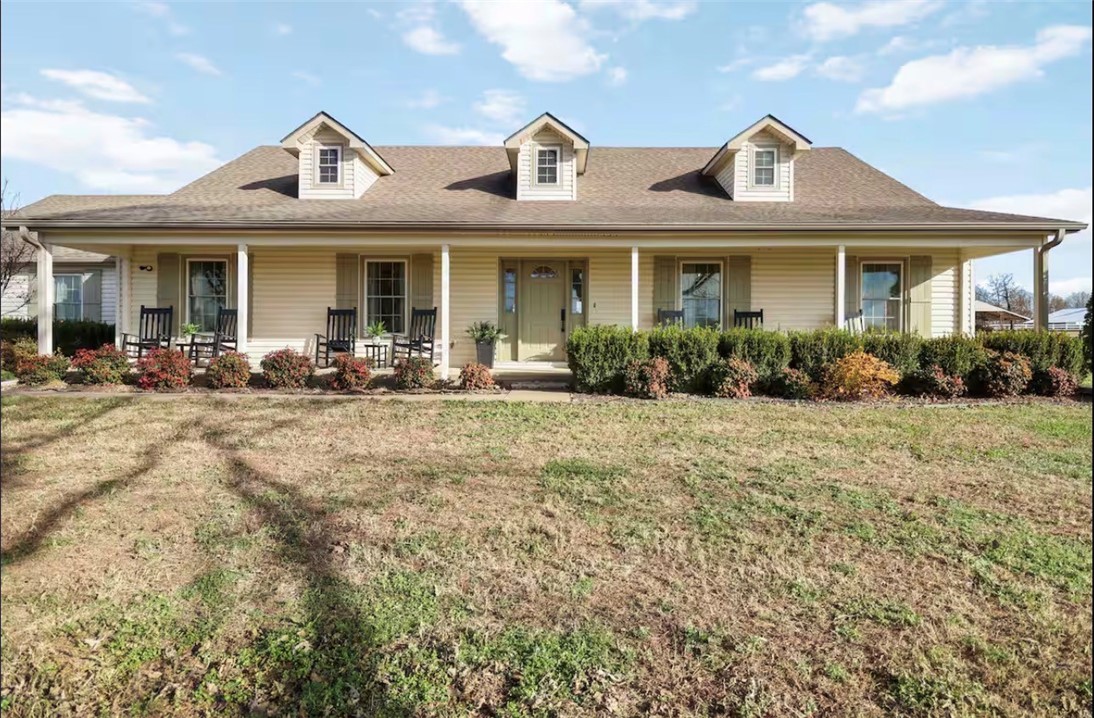 Welcome to this beautiful farmhouse-style retreat currently used as a short term rental set on 3.11 peaceful acres with a gated asphalt drive offering both privacy and curb appeal.  This spacious 4 bedroom 2 bath, and a versatile bonus room, perfect for a game room. Features an attached 3 car garage with 1/2 bath. With acreage to build that perfect shop building with no covenants.

Inside, you’ll love the mix of hardwood and tile floors, complemented by elegant tray ceilings in the primary suite and dining room that adds timeless character,  the thoughtfully designed layout includes a splitfloor plan, formal dining room, breakfast room, and inviting foyer, ideal for both everyday living and entertaining

With room to roam outdoors this property blends comfort, style, and country living while offering modern convenience.  A rare opportunity to enjoy space, privacy and charm all in one place.  All within minutes of the university of Arkansas, downtown fayetteville and the new 612 bypass for easy north access