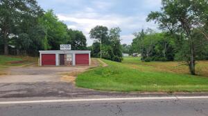 27 unit storage facility with office; 23 yr old, 99% capacity.  10 - 10'x10' $39/month; 12 - 10' x 15' $49/month; 5 - 10' x 20' $59/month.  $1200/month potential income.Office has window air and space heat. Electric through OG&E.