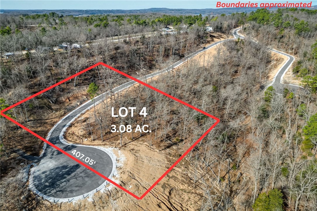 Discover the perfect canvas for your custom Beaver Lake area retreat at Blisslake, a new fully paved subdivision featuring 9 premier estate-sized lots with dedicated community recreation area and lakefront access for all lot owners. This 3.08-acre lot offers the ideal blend of privacy, natural beauty, & proximity to some of Northwest Arkansas' most sought-after amenities. Ideally located at the Northern end of Beaver Lake near Hobbs State Park & Rocky Branch Marina, the property is surrounded by endless opportunities for hiking, biking, boating, & outdoor recreation as well as just 20 minutes from downtown Rogers! The sloping terrain & serene wooded setting provide an exceptional backdrop for a luxury home designed to complement the Ozark landscape. Underground electric & water are available at the street, allowing for a visually clean, unobstructed setting while streamlining the building process. Build your dream home & experience the best of the Natural State!